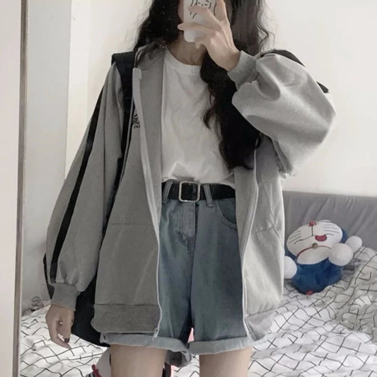 Women's oversized Harajuku fleece hoodie sweatshirt by Jelieora Venture, featuring a cozy, stylish design and a relaxed fit.
