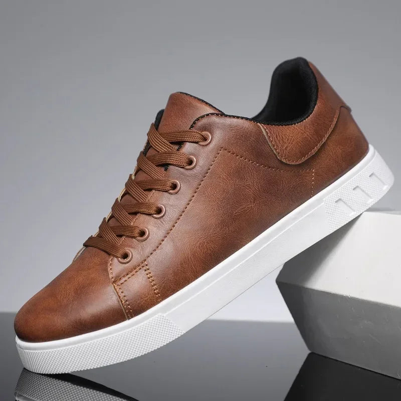Men's leather loafer shoes by Jelieora Venture, stylish brown loafers with classic design and sleek finish.