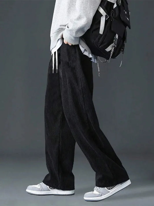 Men's straight leg corduroy trousers by Jelieora Venture, shown in a classic fit with textured fabric and front pockets.