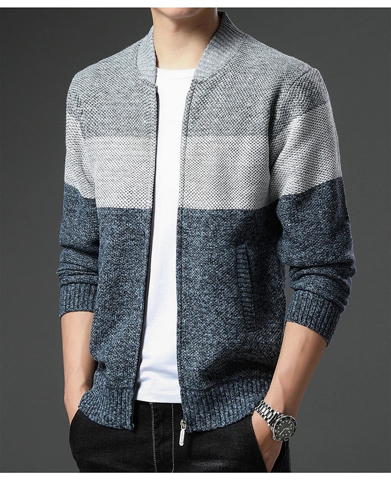 Men's knitted cardigan jumper by Jelieora Venture, featuring a cozy design with buttons and ribbed cuffs, in a neutral color.