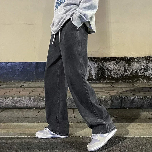 Men's wide leg streetwear jeans by Jelieora Venture, showing front view with relaxed fit and classic denim styling.