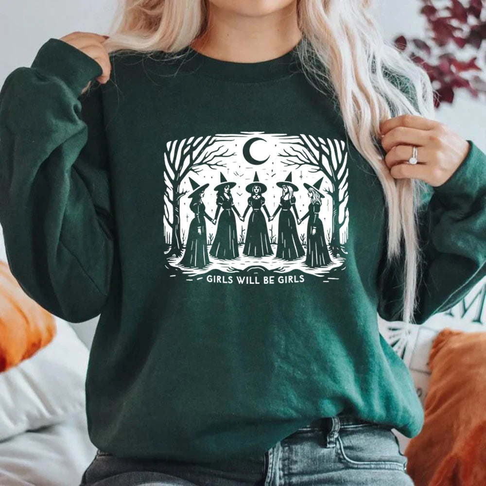 Girls Will Be Girls witch sweatshirt by Jelieora Venture featuring a cozy black sweatshirt with witch-themed graphic print.