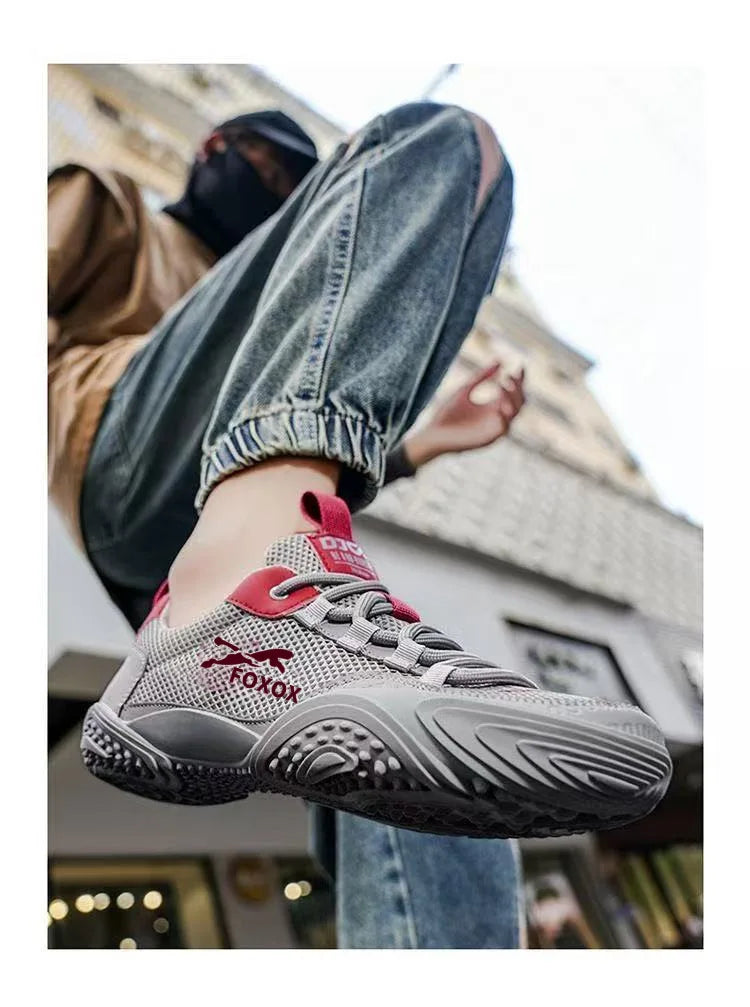 Men's mesh running trainers by Jelieora Venture featuring breathable mesh uppers and cushioned soles for comfort.