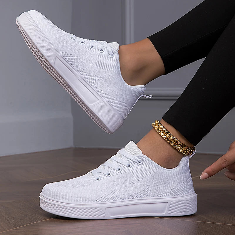 Women's breathable mesh chunky sneakers by Jelieora Venture, showcasing stylish white footwear with thick soles and mesh upper.