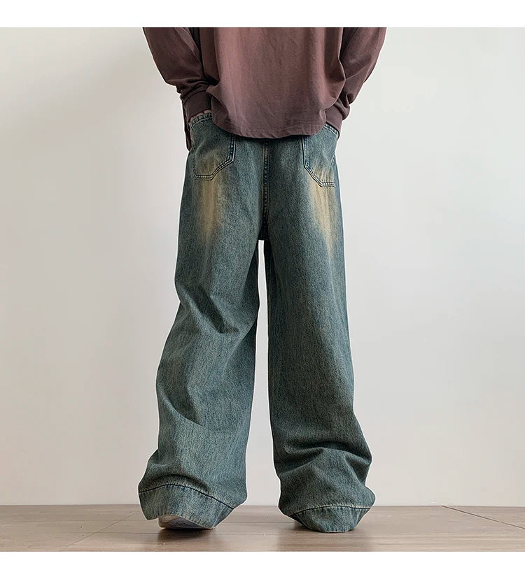 Men's distressed wide leg baggy jeans by Jelieora Venture, featuring a relaxed fit and rugged distressed details.