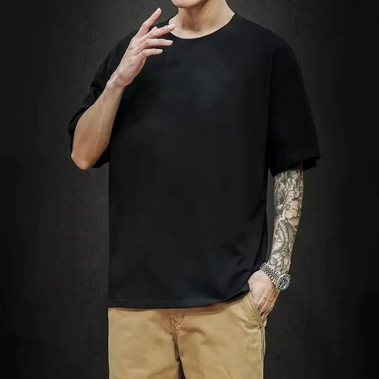 Men's solid basic cotton hip hop T-shirt by Jelieora Venture in black, showing front view with round neckline and short sleeves.