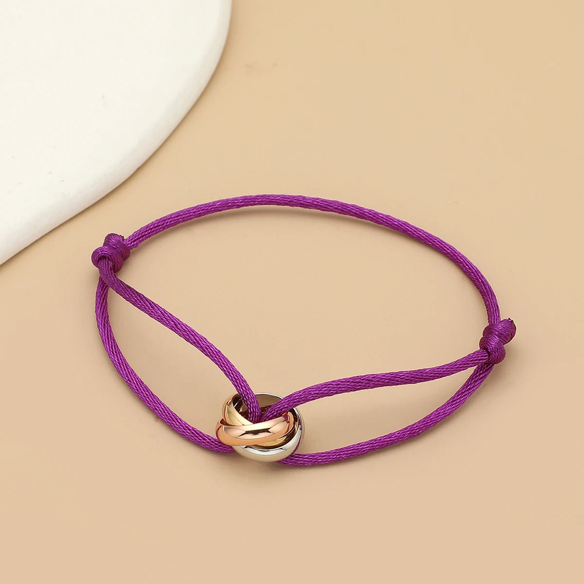 Simple fashion unisex bracelet with three metal round circles, adjustable men's rope jewelry by Jelieora Venture.