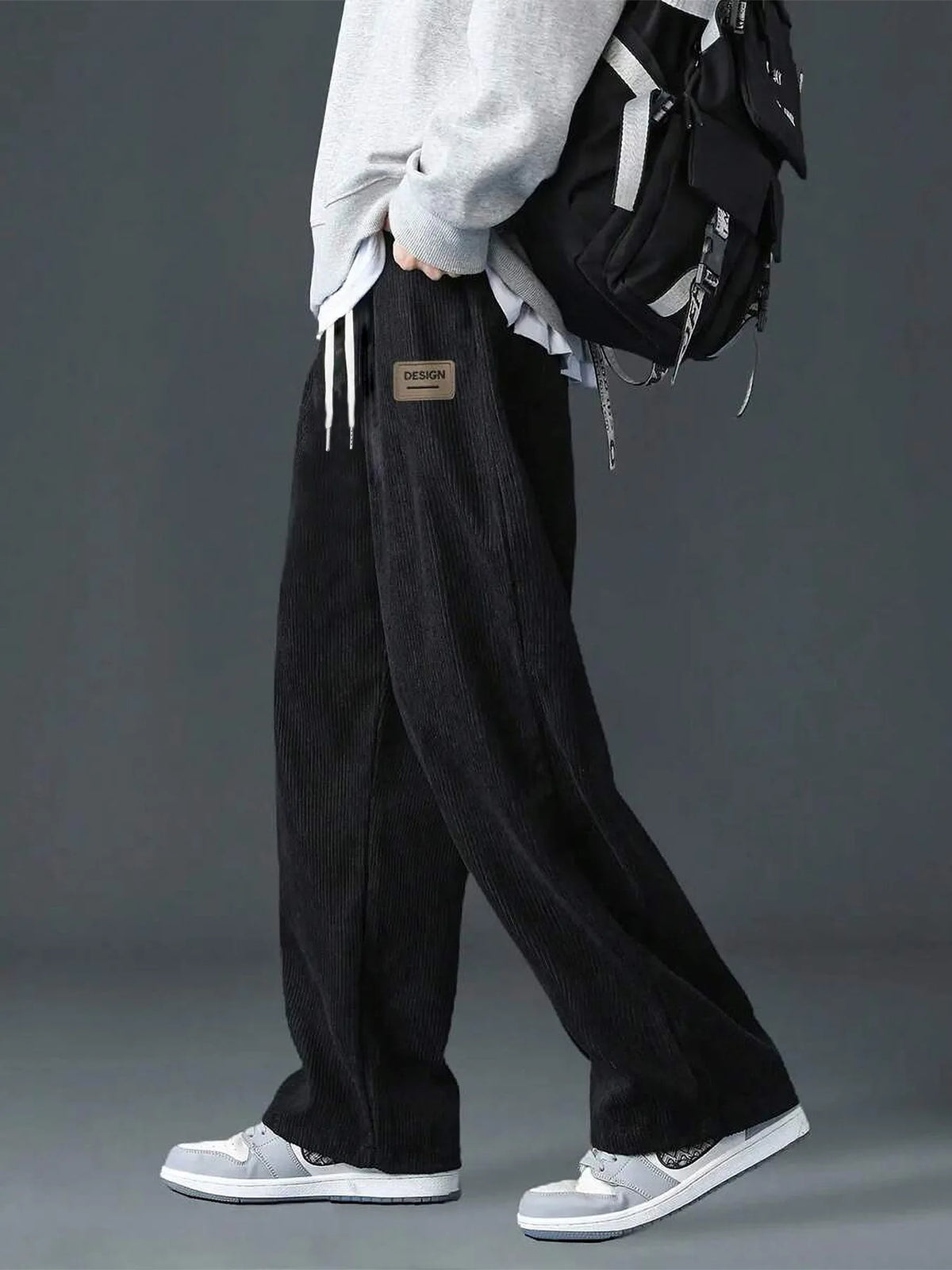 Men's straight leg corduroy trousers by Jelieora Venture, shown in a close-up image highlighting the fabric and fit.