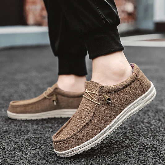 Men's denim canvas trainers by Jelieora Venture, showing stylish sneakers with white soles and classic design on a neutral background.