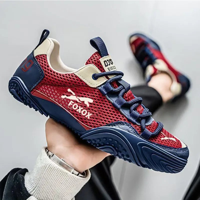 Men's mesh running trainers by Jelieora Venture featuring breathable fabric, cushioned soles, and a sleek sporty design.