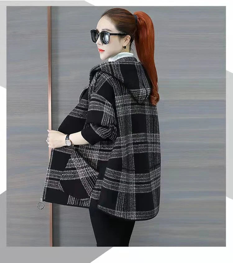 Plus size women's plaid fleece-lined coat by Jelieora Venture, showcasing a cozy, warm winter coat with a checkered pattern.