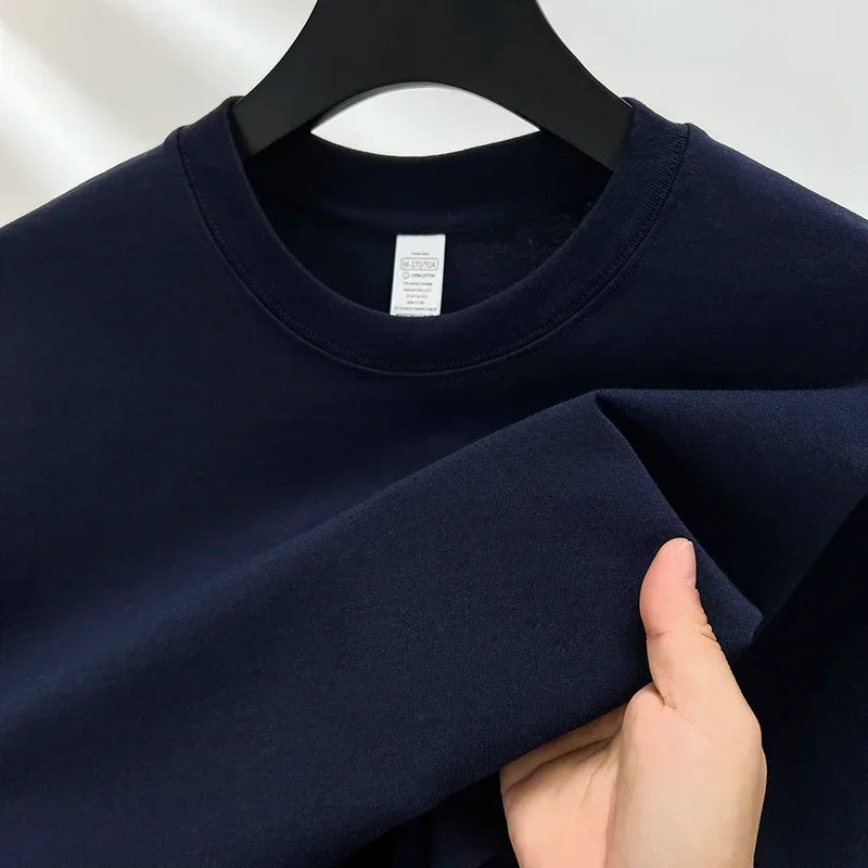Men's 100% cotton round neck T-shirt by Jelieora Venture, breathable everyday tee in classic design, shown in black.