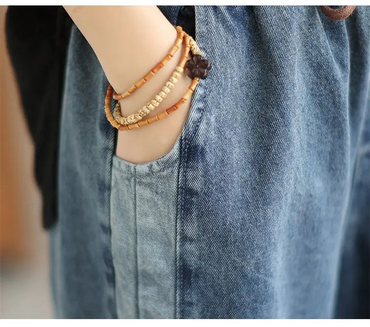 Women's denim harem pants by Jelieora Venture, featuring a relaxed fit with a stylish, casual design.