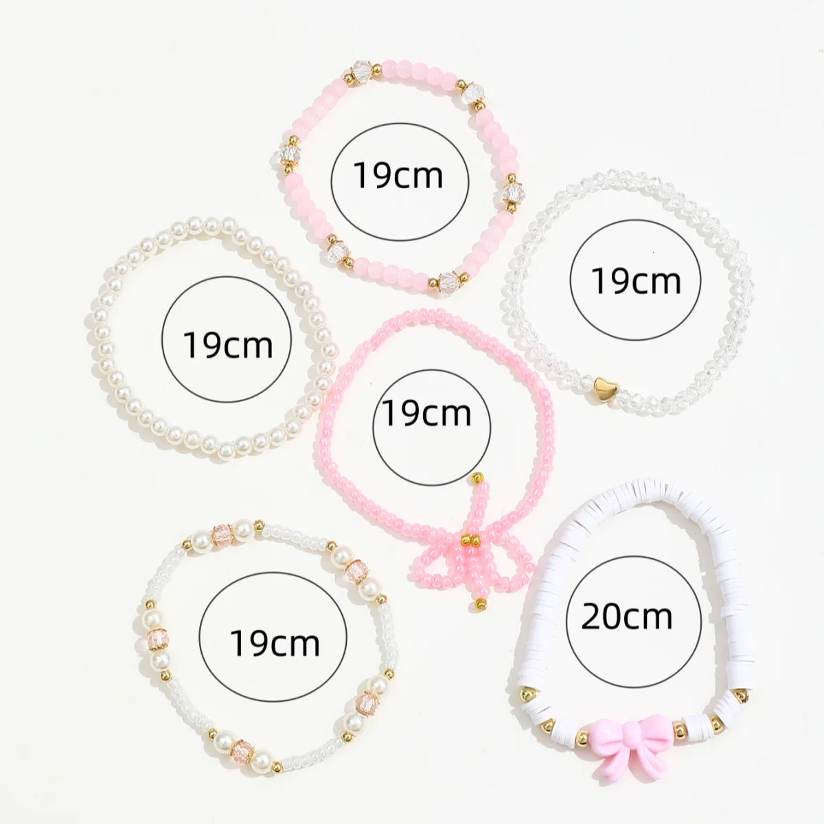 Six-piece set of European and American cute pearl love beaded bow bracelets for women, featuring simple, sweet jewelry design.