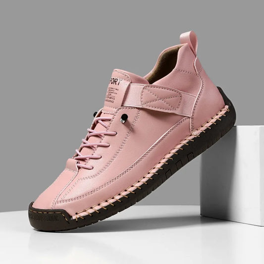 Unisex retro slip-on loafers made of brown PU leather from Jelieora Venture, showcasing their classic design and smooth finish.