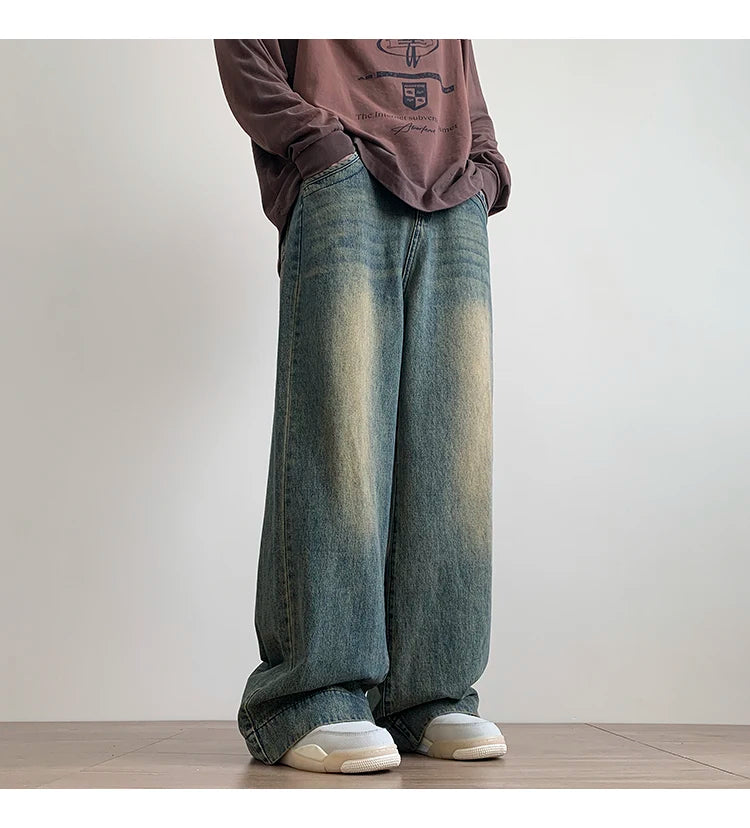 Men's distressed wide-leg baggy jeans by Jelieora Venture, showcasing ripped details and relaxed fit in a casual bottom style.