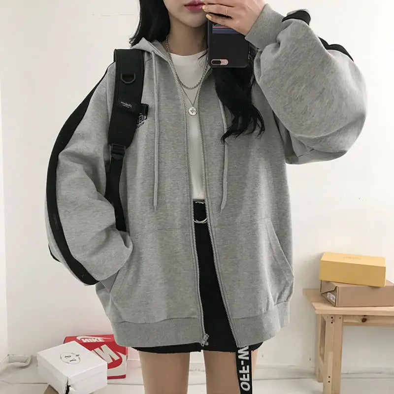 Women’s oversized Harajuku fleece hoodie sweatshirt by Jelieora Venture, shown in soft pink with a relaxed fit and cozy fleece fabric.