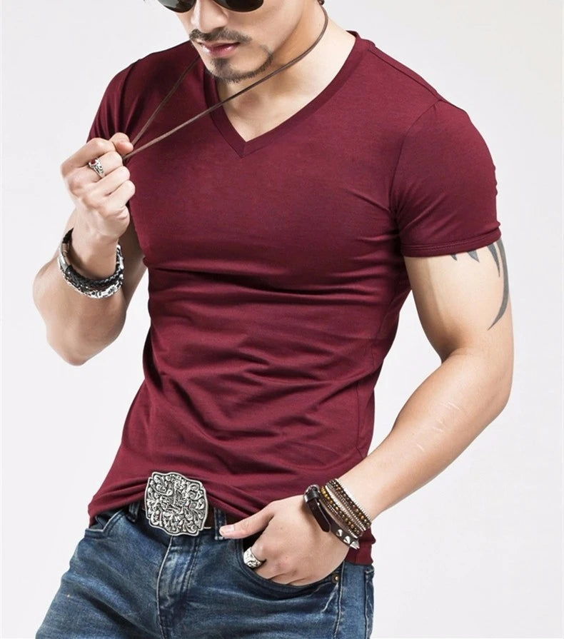 Men's V-Neck fitness T-shirt by Jelieora Venture, featuring a comfortable fit and lightweight fabric, shown on a model.