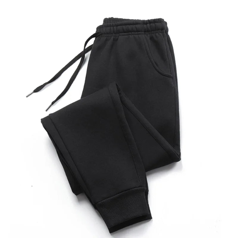 Men's grey fleece jogger sweatpants by Jelieora Venture, shown with elastic waistband and relaxed fit for comfort and casual style.
