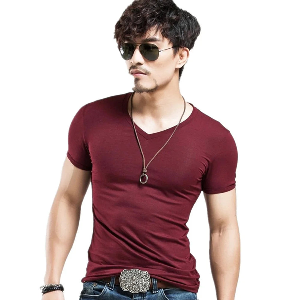 Men's V-Neck Fitness T-Shirt by Jelieora Venture, black, lightweight fabric, close-up of the V-neck design and smooth texture.