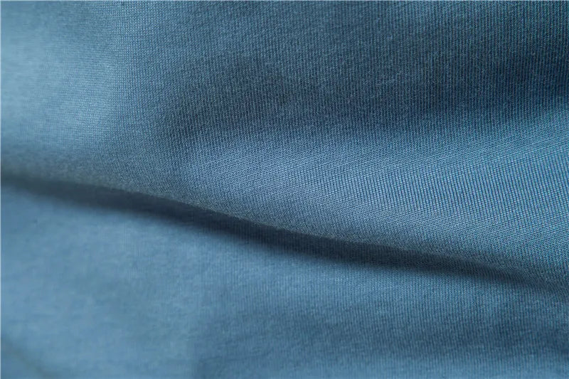 Men's cotton long sleeve t-shirt by Jelieora Venture, shown in a neutral color with a classic fit and crew neckline.