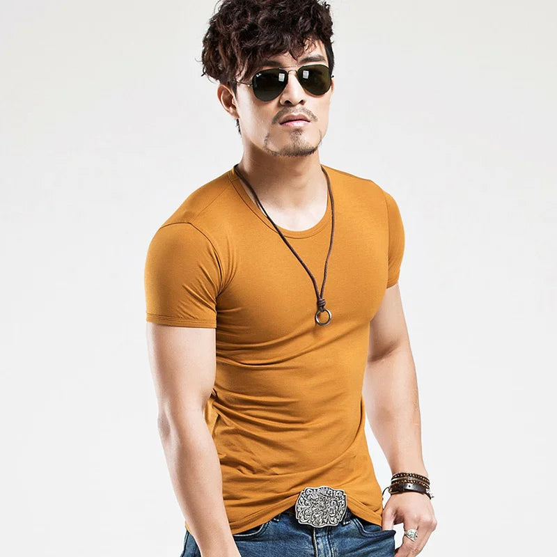 Men's V-neck fitness t-shirt by Jelieora Venture, close-up of black athletic shirt with V-neck and breathable fabric.