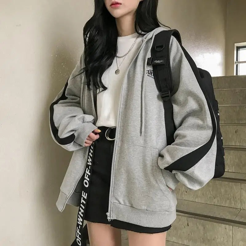 Women’s oversized Harajuku fleece hoodie sweatshirt by Jelieora Venture, featuring a cozy, relaxed fit with bold streetwear style.