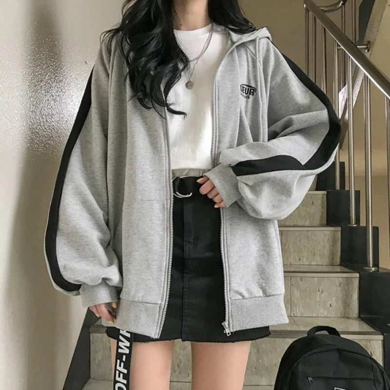Women's oversized Harajuku fleece hoodie sweatshirt by Jelieora Venture, featuring a cozy, stylish design with a relaxed fit.
