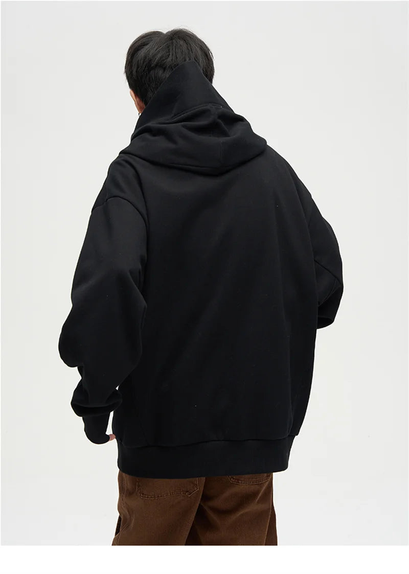 Men's black turtleneck hoodie by Jelieora Venture, featuring a snug fit and soft fabric, displayed on a neutral background.