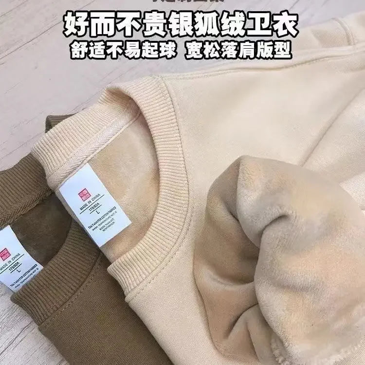 Unisex oversized fleece sweatshirt by Jelieora Venture with a cozy, relaxed fit in soft fabric, shown in a neutral color.