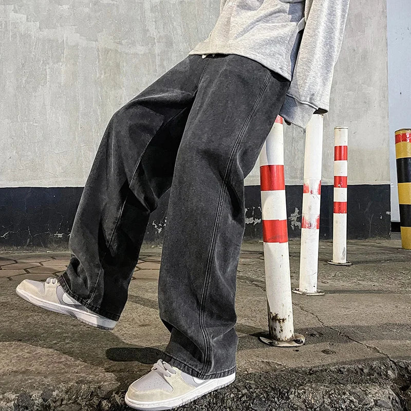 Men's wide leg streetwear jeans by Jelieora Venture featuring a relaxed fit and classic denim style.