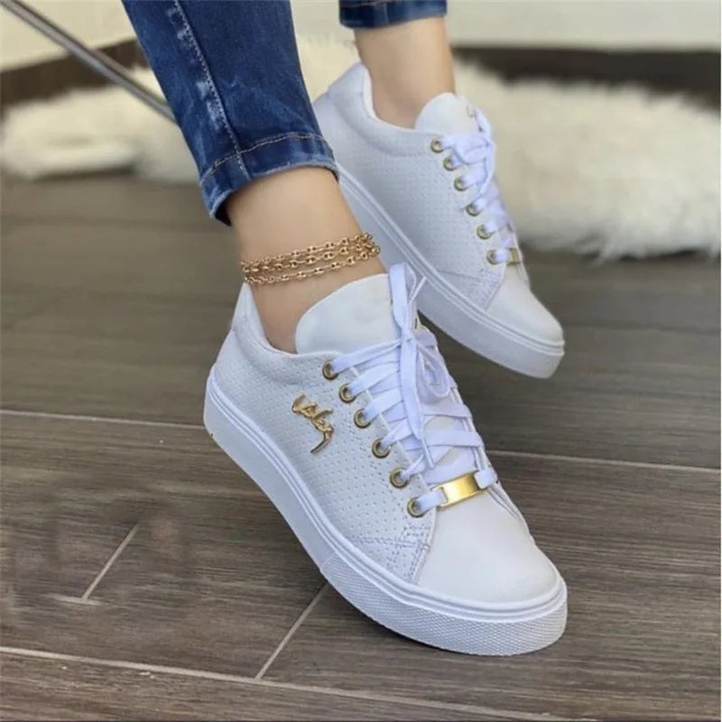 Women's lace-up vulcanized flat sneakers by Jelieora Venture featuring classic design and white rubber soles.