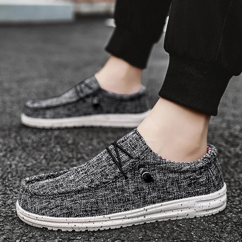 Men's denim canvas trainers by Jelieora Venture featuring casual style with white rubber soles and classic lace-up design.
