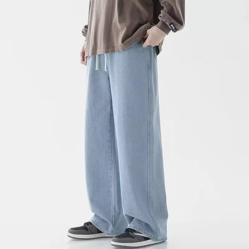 Men's Korean straight leg wide-leg jeans by Jelieora Venture, showing the denim fabric and relaxed fit style.