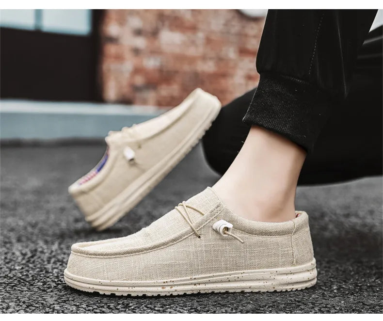 Men's denim canvas trainers by Jelieora Venture featuring casual design, white rubber soles, and classic lace-up style.