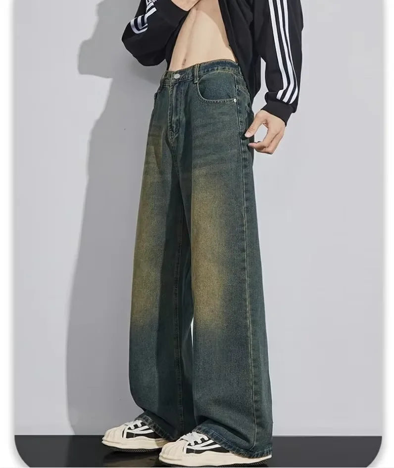 Men's distressed wide-leg jeans by Jelieora Venture featuring faded denim and relaxed fit with ripped details.