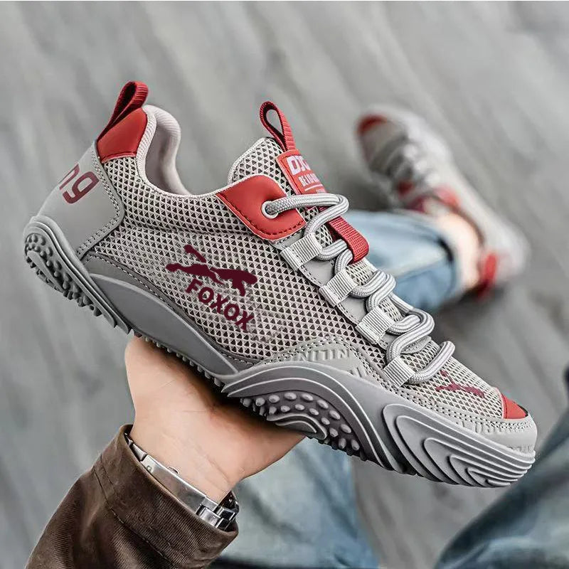 Men's mesh running trainers by Jelieora Venture featuring breathable mesh uppers and supportive rubber soles for active running.