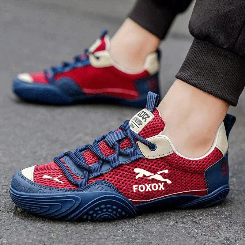 Men's mesh running trainers by Jelieora Venture featuring breathable mesh uppers and sporty design for active wear.