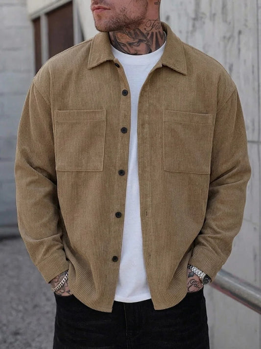 Men's corduroy shirt jacket by Jelieora Venture, featuring a classic fit with button closure and chest pockets in a warm earth tone.