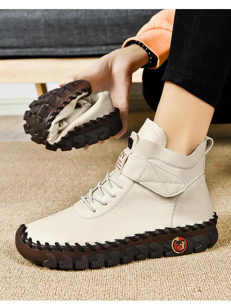 Women's waterproof ankle snow boots with faux fur lining by Jelieora Venture, featuring a stylish winter footwear design.