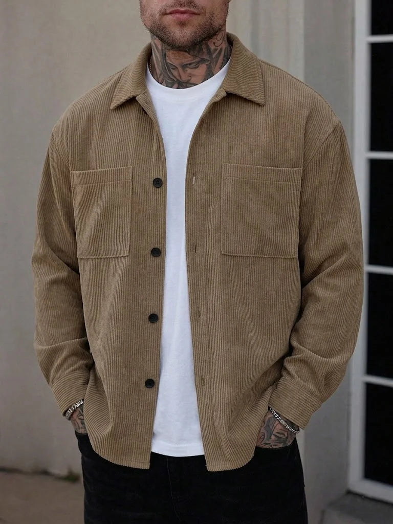 Men's Jelieora Venture corduroy shirt jacket featuring a button-up front, classic collar, and textured fabric in earthy tones.