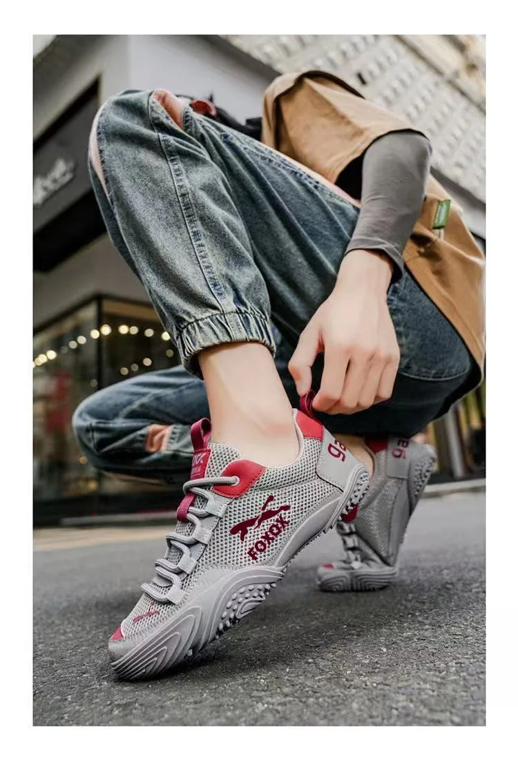 Men's mesh running trainers by Jelieora Venture featuring breathable mesh uppers and cushioned soles for comfort during exercise.