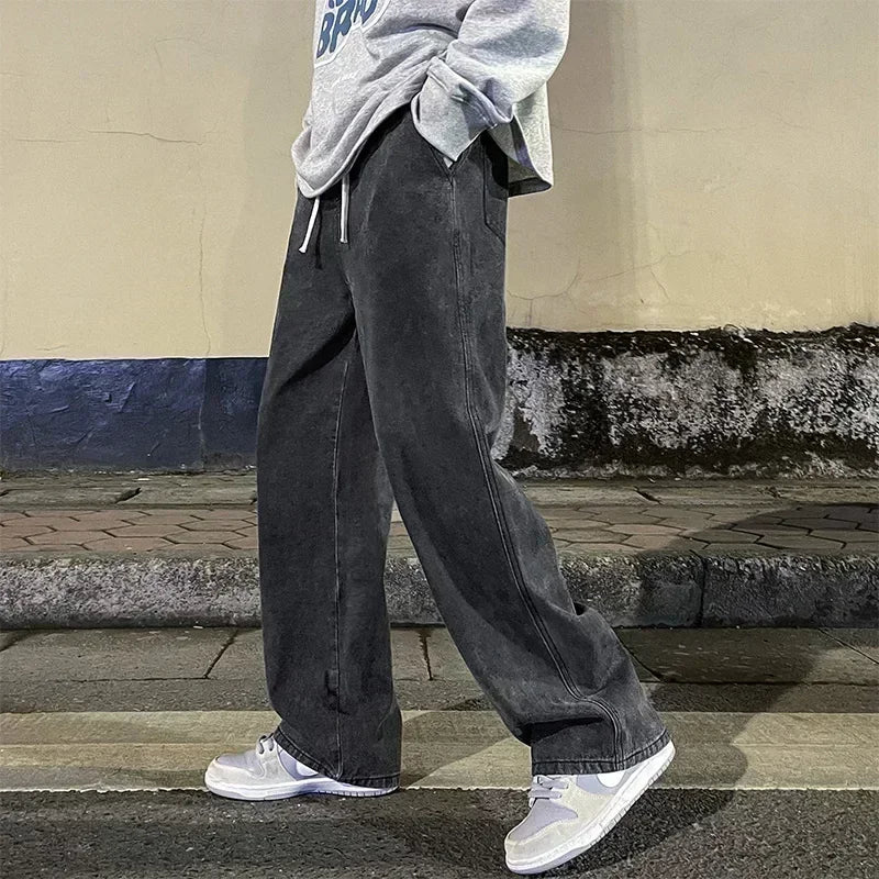 Men's wide leg streetwear jeans by Jelieora Venture, showing front view with relaxed fit and classic denim styling.