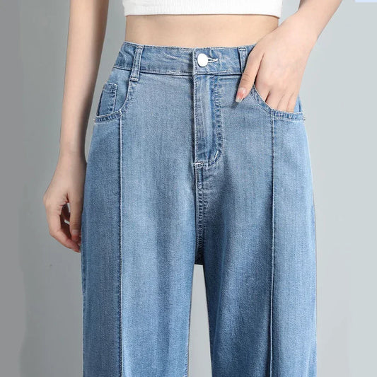 Women's high waist wide leg jeans by Jelieora Venture, featuring a classic fit and denim fabric, shown on a model.