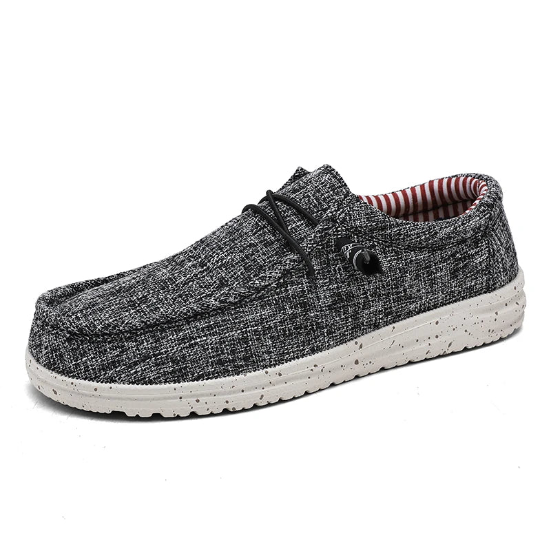 Men's denim canvas trainers by Jelieora Venture featuring casual style and white rubber soles.