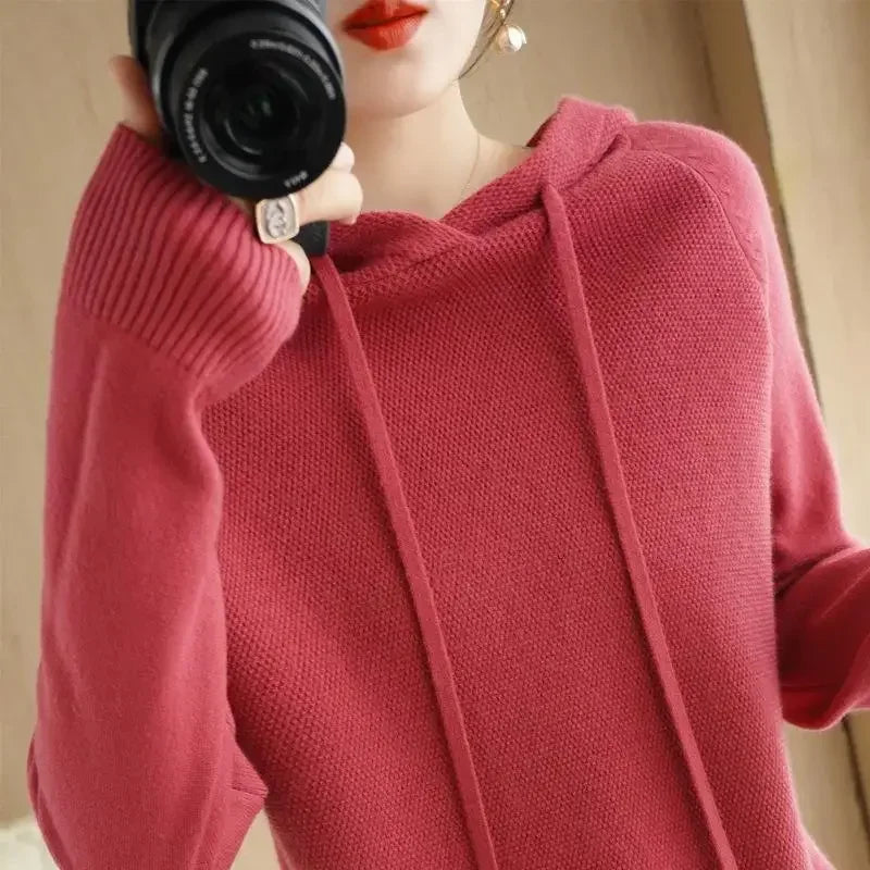 Women's knitted hoodie jumper by Jelieora Venture, featuring a cozy, soft knit fabric and a stylish hooded design.