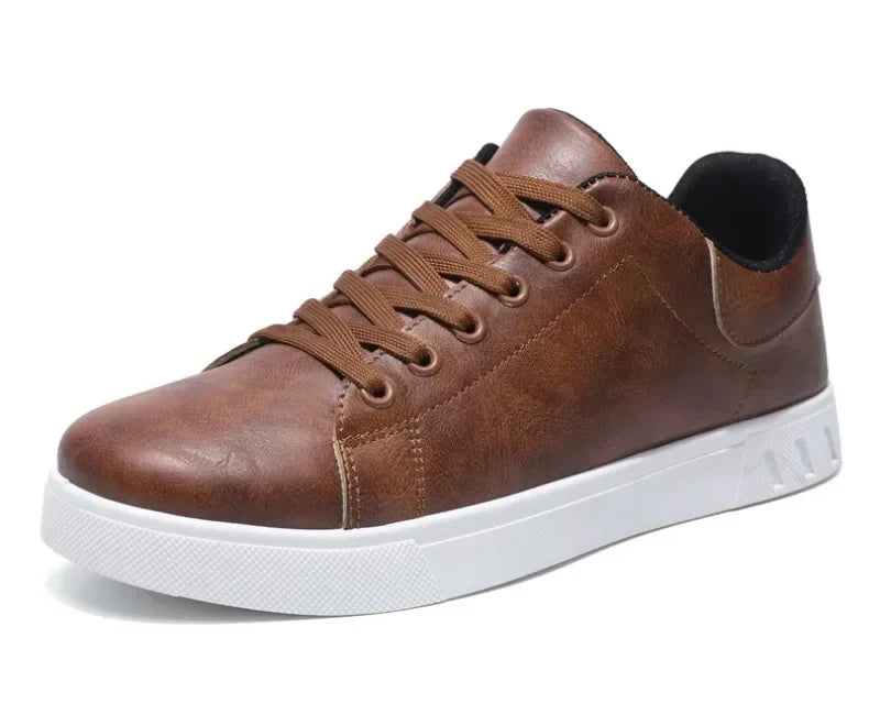 Men's leather loafer shoes by Jelieora Venture, stylish brown loafers with sleek design and slip-on style.
