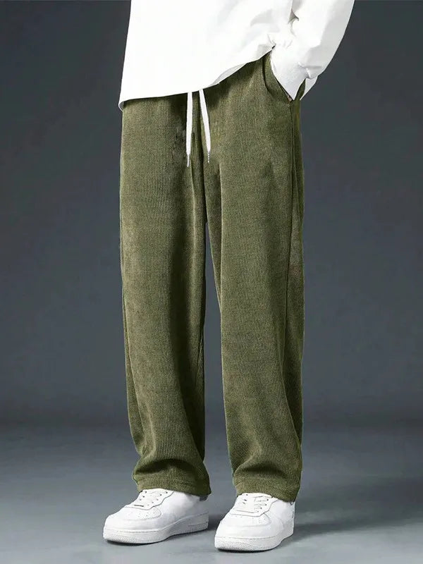 Men's straight leg corduroy trousers by Jelieora Venture, shown in a neutral color with a classic fit and detailed waistband.