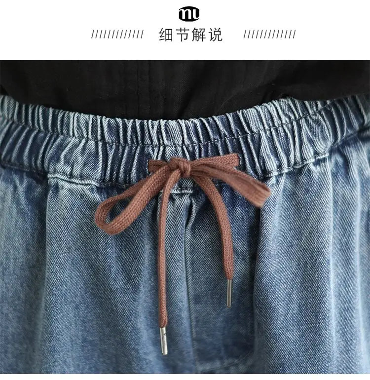 Women's denim harem pants by Jelieora Venture, featuring relaxed fit and stylish design, shown on a model in a casual setting.
