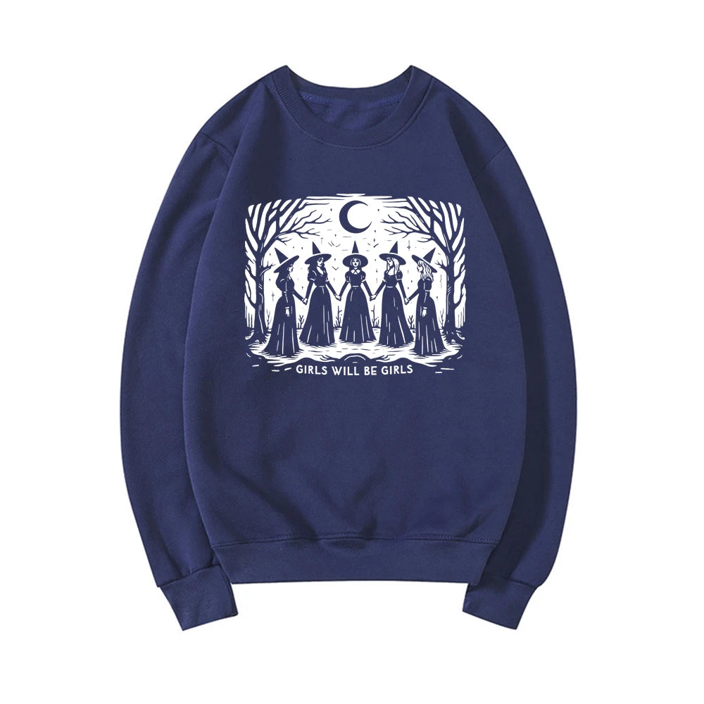 Girls Will Be Girls Witch sweatshirt by Jelieora Venture featuring a cozy black design with witch-themed graphics and bold lettering.